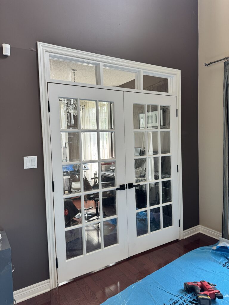 custom French door and transom installed by a finish carpenter in Oakville