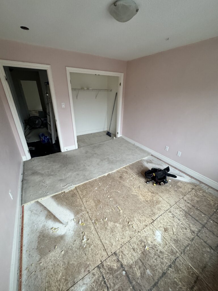 carpet removed before a new flooring installed by a finish carpenter in Brampton